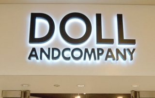 Doll Co Channel Inland Signs